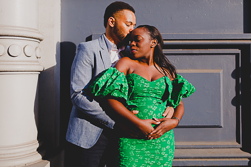 black couple hugging and kissing in Soho NYC