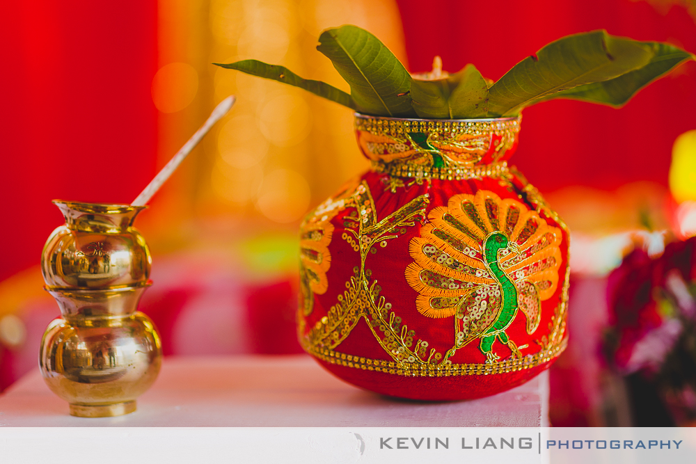 Hindu decorative pot with a plant inside